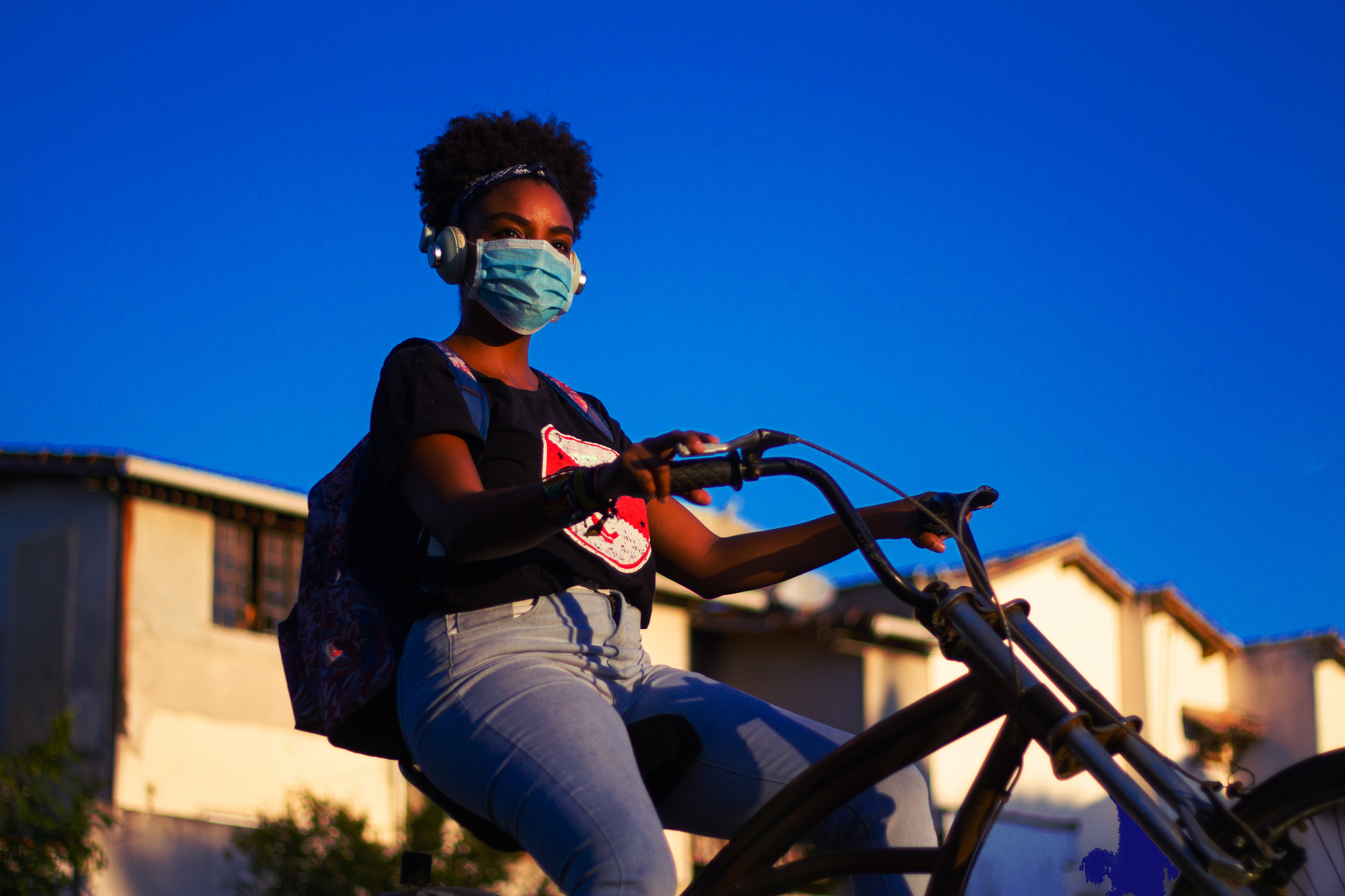 Girl Riding Lowrider Bike On Road